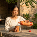 Terra Earth Elixir — Handmade Terracotta Water Bottle with Leaf Carving