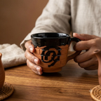 Terracotta Coffee Cup — Black Glazed Clay Cup with Engraved Spiral Motif