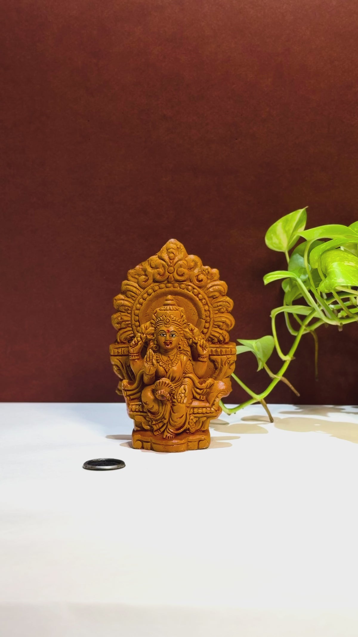 Terracotta Lakshmi Statue — Handcrafted Clay Goddess Lakshmi with Decorative Prabhavali